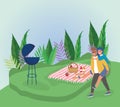 Man carrying woman grill food blanket picnic