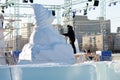 A man carves a sculpture out of ice in winter in a snowy park, Moscow, January 7, 2022