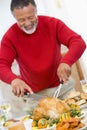 Man Carving Roast Chicken Royalty Free Stock Photo