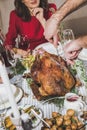 Man carving roasted turkey