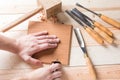Man carving wood with handtools Royalty Free Stock Photo
