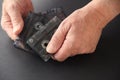 Man with cassette tapes on dark background Royalty Free Stock Photo