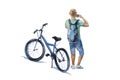Man in casual clothing stop his bike to make a photo of sightseeing. Original watercolor illustration of tourists and bicycle for
