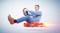 Man in casual wear car driver with a wheel, concept of rocket alternative transport Royalty Free Stock Photo