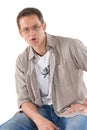 Man casually sitting on stool