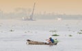 A man catching fish on Mekong river in Tra Vinh, Vietnam