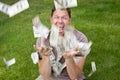 Man catching paper money