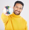 Man, cd and smile in studio portrait for music, tech or software for data, info or sound by white background. Student Royalty Free Stock Photo