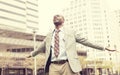 Man celebrates freedom success arms raised looking up