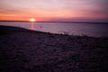 Simple beach and sand landscape with sunset ocean background