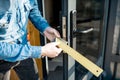 Man changing core of a door lock Royalty Free Stock Photo