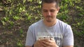 Man chating with someone using smartphone