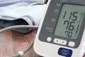 Man check blood pressure monitor and heart rate monitor with digital pressure gauge. Health care and Medical concept Royalty Free Stock Photo