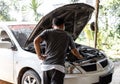 A man check broken car and open bonnet. Car broak down and accident Royalty Free Stock Photo