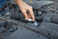 Man check the coolant level of car Royalty Free Stock Photo