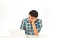 Man in check shirt with laptop Royalty Free Stock Photo