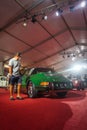Man checked a Porsche 911 targa on display at Jogja VW festival Royalty Free Stock Photo
