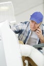 man checking air conditioning maintenance problem Royalty Free Stock Photo