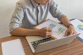 Man checking financial number on the sale report