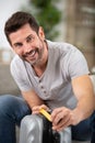 Man checking hand luggage length Royalty Free Stock Photo