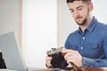 Man checking photographs in camera Royalty Free Stock Photo