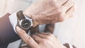 Man checking time his watch Royalty Free Stock Photo