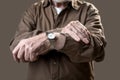 Pensioner showing his wristlet watch Royalty Free Stock Photo