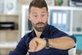 man checking time watch Royalty Free Stock Photo