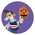 Man with a cheeky smile and big nose pointing at a Halloween pumpkin round sticker label Royalty Free Stock Photo