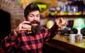 Man with cheerful face sit alone at bar counter. Royalty Free Stock Photo