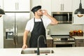 Man chef cooker, baker. Man chefs with sign of perfect food. Chef man cooking, showing sign for delicious. Chef, cook Royalty Free Stock Photo