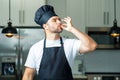 Man chef cooker, baker. Man chefs with sign of perfect food. Chef man cooking, showing sign for delicious. Chef, cook Royalty Free Stock Photo