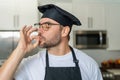 Man chef cooker, baker. Male chefs with sign of perfect food. Chef man cooking, showing sign for delicious. Chef, cook Royalty Free Stock Photo