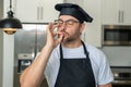 Man chef cooker, baker. Man chefs with sign of perfect food. Chef man cooking, showing sign for delicious. Chef, cook Royalty Free Stock Photo