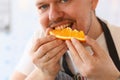 Man Chef Eating Juice Orange Kitchen Portrait Royalty Free Stock Photo