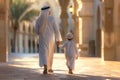 A man and a child are walking down a street in a foreign country Royalty Free Stock Photo