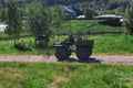 Man with children rides a makeshift swamp buggy through the village in Perm Krai, Russia