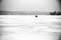 Man and Children Walking on Frozen Lake. Ice Fishing.