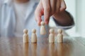 Man Choose figure standing out from the group of crowd. Choice of employee leader from the crowd.