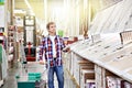 Man chooses floorboard for home renovation Royalty Free Stock Photo