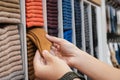 Man chooses socks on sale in department store. Royalty Free Stock Photo