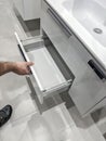 a man chooses a washbasin in a shopping mall