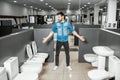 Man choosing lavatory pan in the shop Royalty Free Stock Photo