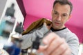 man choosing refill for vaporiser Royalty Free Stock Photo