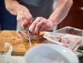 Man chopping chicken wings Royalty Free Stock Photo