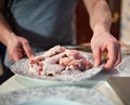 Man chopping chicken wings Royalty Free Stock Photo