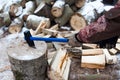 Man chopping wood in the winter Royalty Free Stock Photo