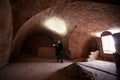 Man in church crypt