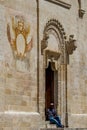 Man, Church stairs, door and Sun, Matera, Italy Royalty Free Stock Photo