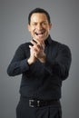 Man claps his hands Royalty Free Stock Photo